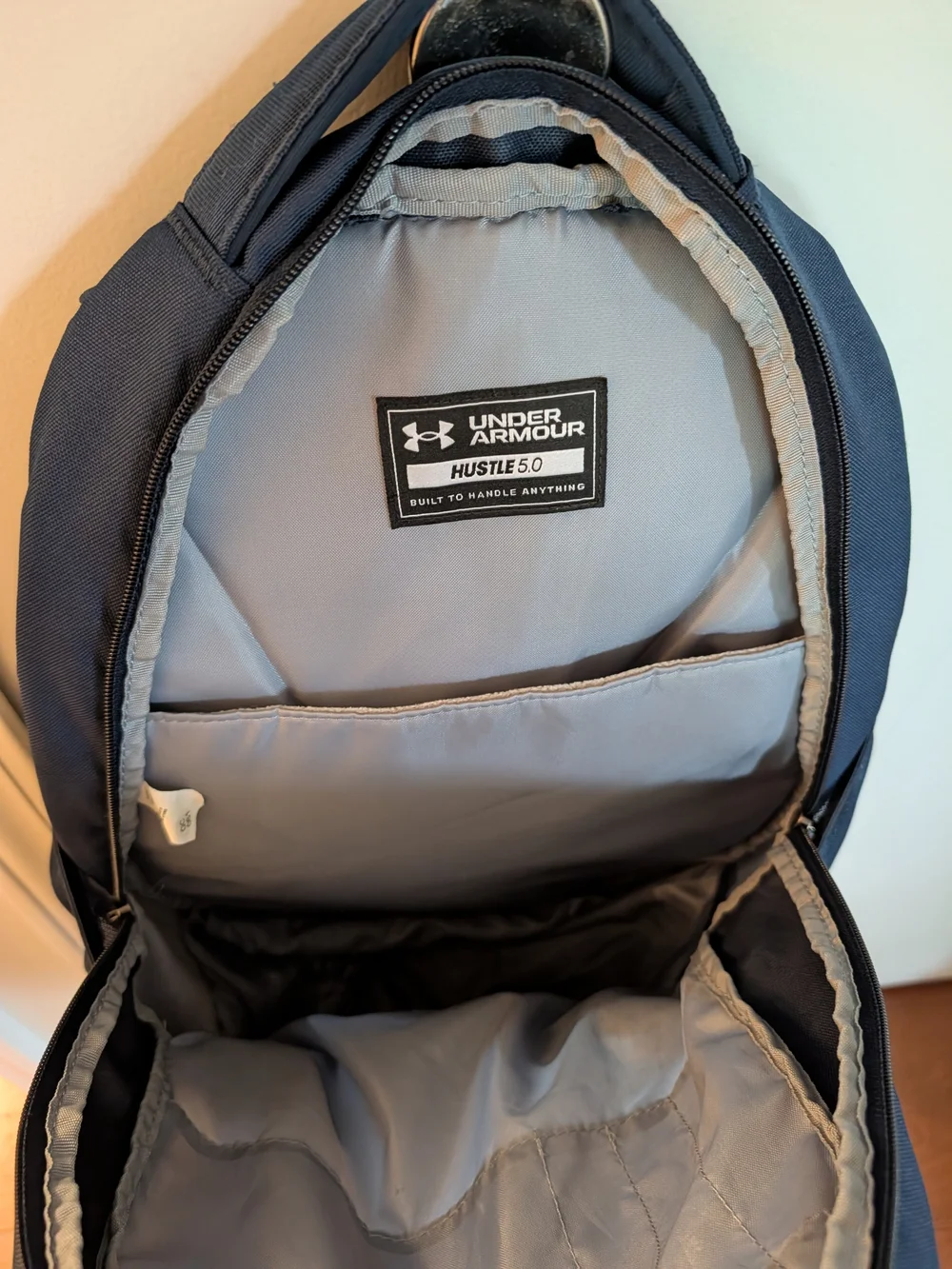 Under Armour Hustle 5.0 Navy blue Backpack with Silver Logo